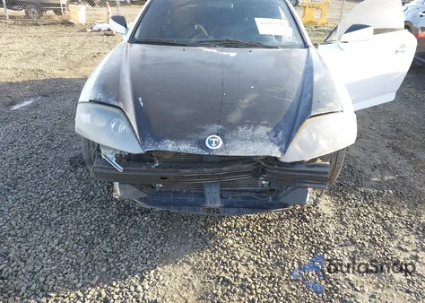 2003 Hyundai Tiburon from USA, damaged, VIN KMHHM65DX3U095780